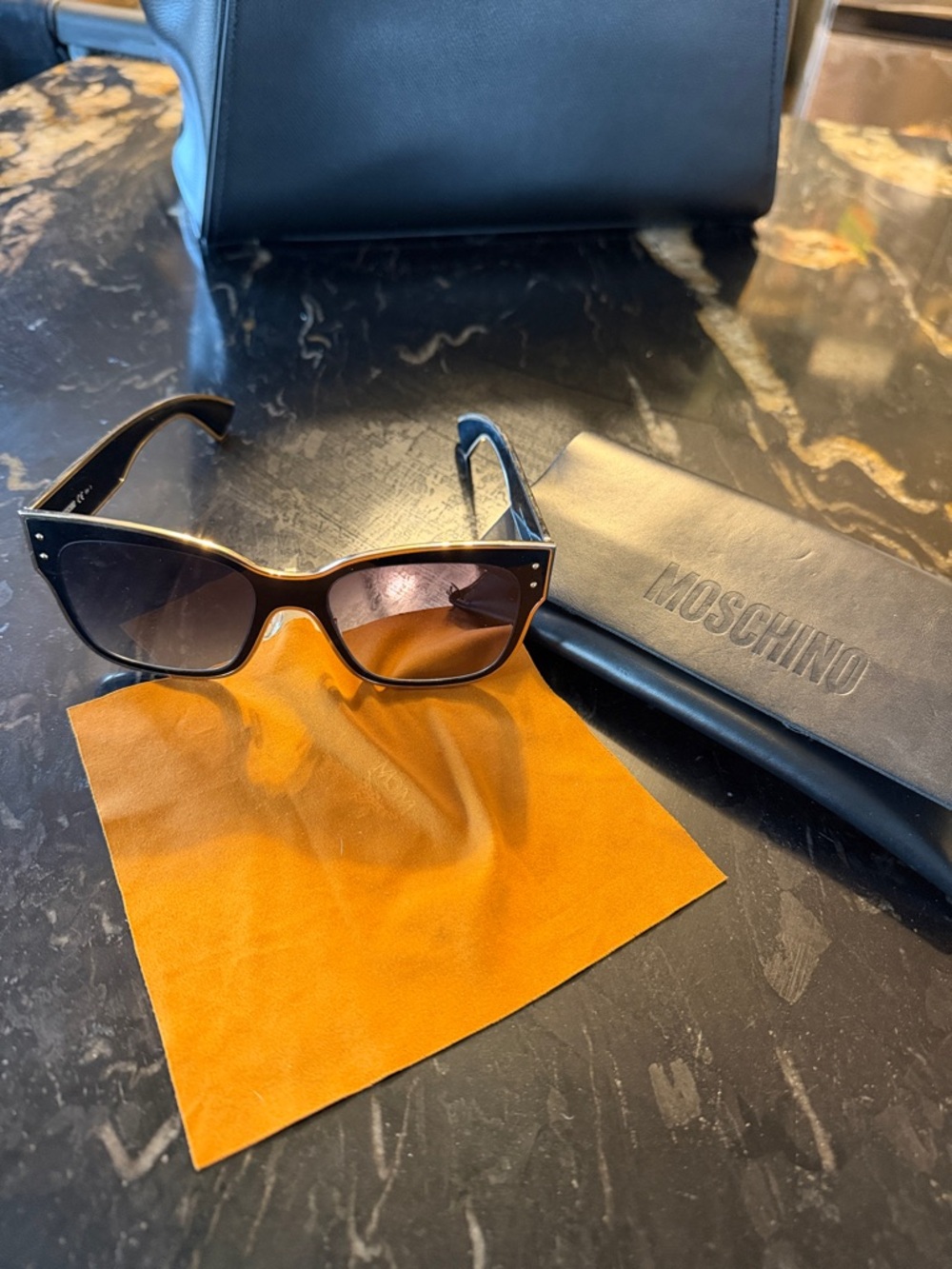 Moschino Black Cat-Eye Sunglasses with Brown Gradient Lenses